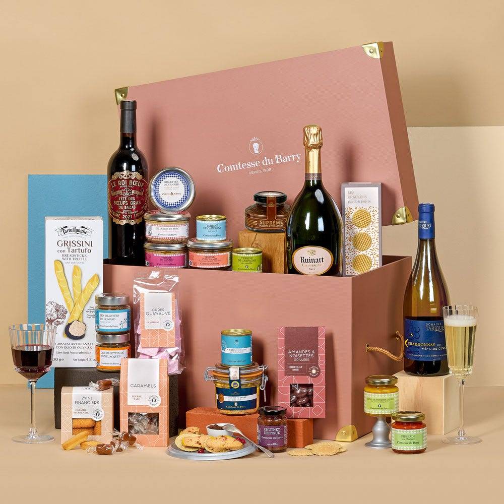 Malle gourmande Les Trésors d'Exception Comtesse du Barry avec Champagne Ruinart, vins, foie gras entier, spécialités de canard, créations marines, tartinables et gourmandises sucrées.