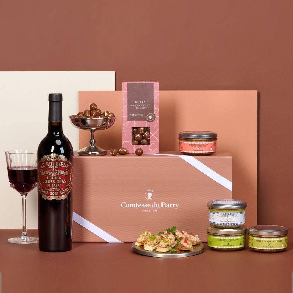 The Classics Edit food hamper with French red wine, duck rillettes, duck terrines and chocolate nougatine treats by Comtesse du Barry.