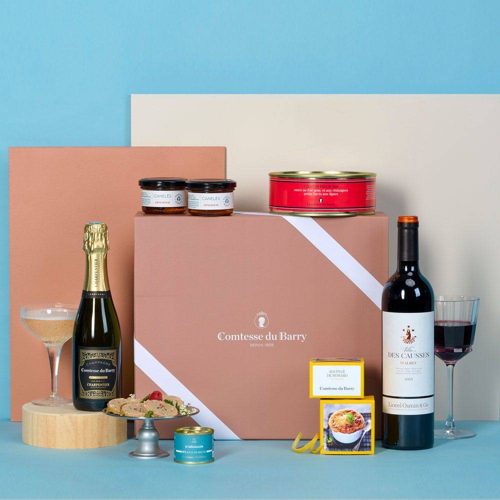 The Prestige Menu food hamper with goose foie gras, lobster soufflés with Chablis, French capon in foie gras and fig sauce, Champagne Brut, Malbec wine and Armagnac canelés by Comtesse du Barry.