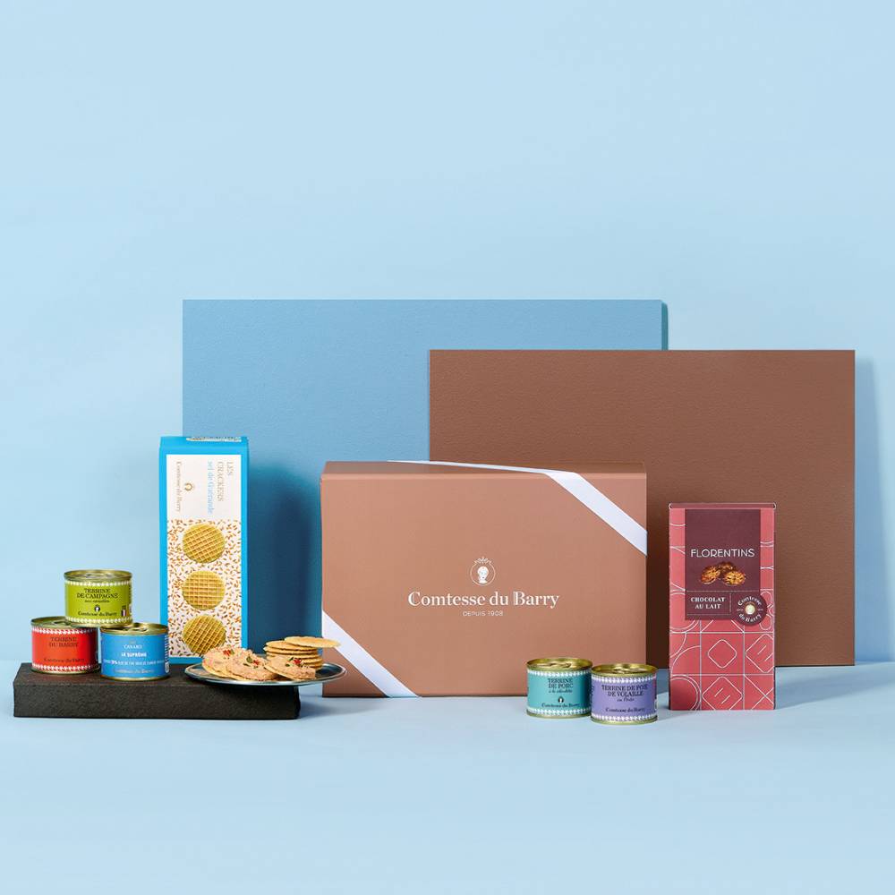 Coffret cadeau L'Éclat Gourmand Comtesse du Barry avec terrines du Sud-Ouest, suprême de canard, crackers au sel de Guérande et florentins au chocolat au lait.