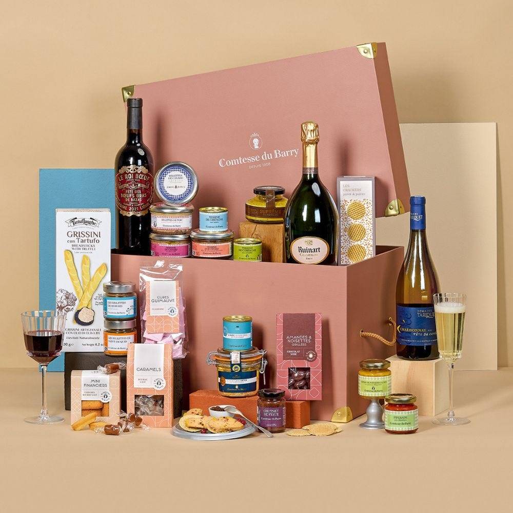 Malle gourmande Les Trésors d'Exception Comtesse du Barry avec Champagne Ruinart, vins, foie gras entier, spécialités de canard, créations marines, tartinables et gourmandises sucrées.